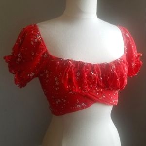 Adorable red, floral crop top size large short sleeves bow/ tie in back